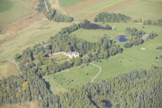 Oblique aerial view of Clava Cairns, looking NW.