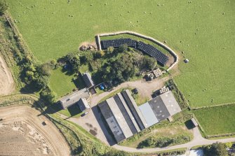 Oblique aerial view of Brightmony House, looking SE.