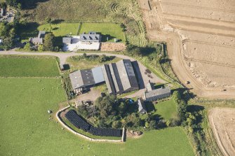 Oblique aerial view of Brightmony House, looking NW.