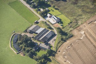 Oblique aerial view of Brightmony House, looking WSW.