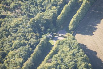 Oblique aerial view of Darnaway Castle West Gate and Lodge, looking W.