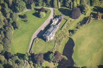 Oblique aerial view of Dunphail House, looking E.