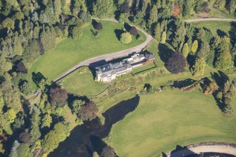 Oblique aerial view of Dunphail House, looking NE.