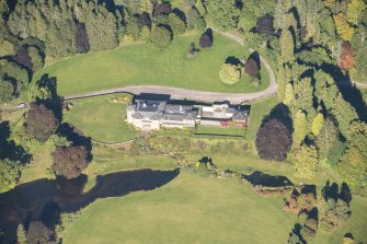 Oblique aerial view of Dunphail House, looking NNE.