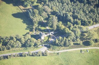 Oblique aerial view of Castle Grant North Lodge, looking E.