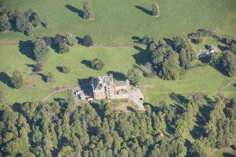 Oblique aerial view of Castle Grant, looking NE.