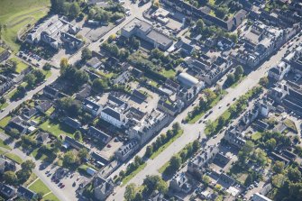 Oblique aerial view of Grantown on Spey High Street, looking N.