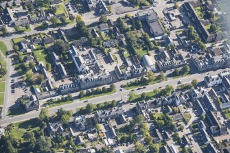 Oblique aerial view of Grantown on Spey High Street, looking NW.