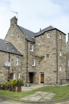 General view of the rear from south.