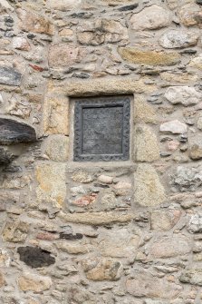 Detail of plaque on south facing wall.
