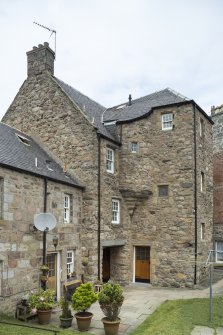 General view of the rear from south.