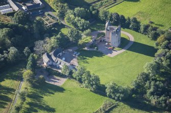 Oblique aerial view of Harthill Castle, looking SSW.