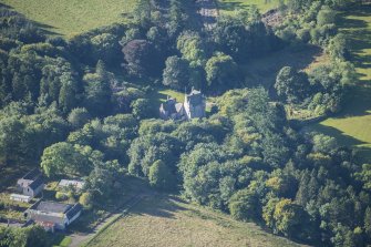 Oblique aerial view of Lickleyhead Castle, looking SSW.