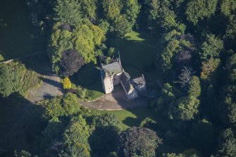 Oblique aerial view of Lickleyhead Castle, looking NNE.