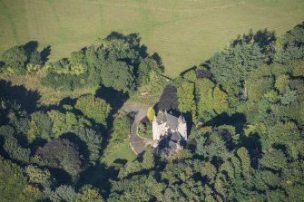 Oblique aerial view of Lickleyhead Castle, looking NNW.