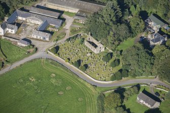 Oblique aerial view of Kirkton of Culsalmond Old Parish Church, looking NW.