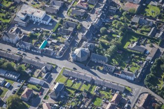 Oblique aerial view of St Margaret's School, St Margaret's Roman Catholic Church and Presbytery, looking S.