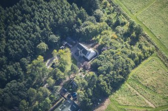 Oblique aerial view of Rothiemay House and Castle, looking ESE.