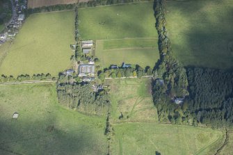 Oblique aerial view of Rothiemay House, Mains of Mayen, Mains of Rothiemay and Rothiemay Castle, looking NW.