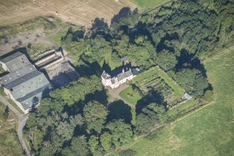 Oblique aerial view of Auchanachie Castle, looking NW.