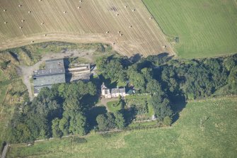 Oblique aerial view of Auchanachie Castle, looking W.