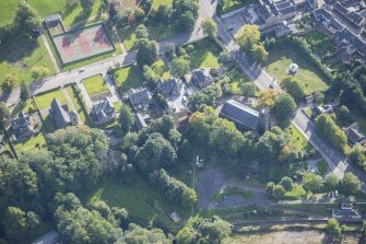 Oblique aerial view of St Rufus Church and Holy Trinity Episcopal Church, looking SE.