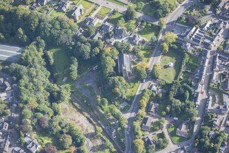 Oblique aerial view of St Rufus Church, looking ENE.