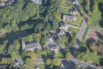 Oblique aerial view of St Rufus Church and Holy Trinity Episcopal Church, looking NW.