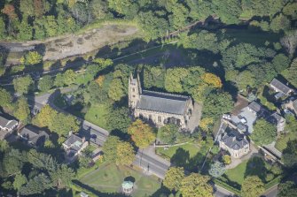 Oblique aerial view of St Rufus Church, looking W.