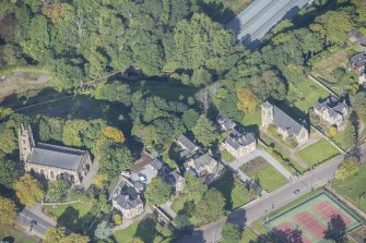 Oblique aerial view of St Rufus Church and Holy Trinity Episcopal Church, looking W.