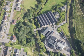 Oblique aerial view of Strathmill Distillery, looking NNE.