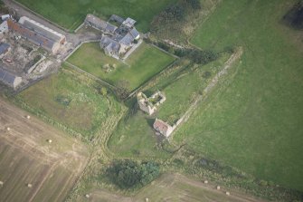 Oblique aerial view of Findochty Castle, looking NE.