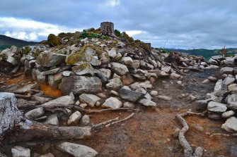 Looking up entrance passage with outer wall face to centre left, Comar Wood Dun, Cannich, Strathglass