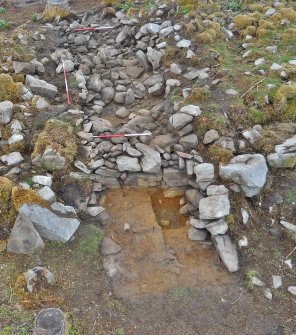 High-pole photo over the dun outer wall face in Trench 2, showing the location of a possible intramural cell in the centre of the wall core, Comar Wood Dun, Cannich, Strathglass