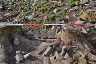 Post-excavation image of east-west-east facing trench section, south end, Comar Wood Dun, Cannich, Strathglass