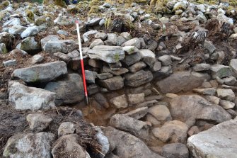Mid-excavation image after initial clean-back showing blocked passage in the outer wall, Comar Wood Dun, Cannich, Strathglass