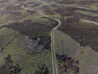 Oblique aerial view of the White Cairn at Glen Cochil, looking NW.