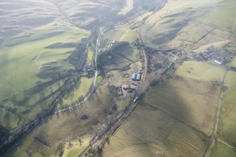 Oblique aerial view of the site of Stobs Camp railway sidings, looking S.