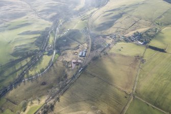 Oblique aerial view of the site of Stobs Camp railway sidings, looking S.