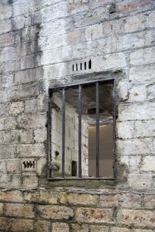 Detail of light box window to the magazine showing ventilation bricks and internal ventilation holes.