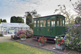 General view of small train carriage which was used to transport guests around Rosyth Navy Dockyard, given as a retirement gift to the present owner of the site.