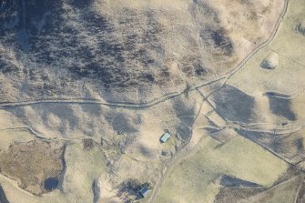 Oblique aerial view of the depopulated township at Cambs and the Grave of Diarmid four poster stone circle in Glen Shee, looking NE.