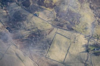 Oblique aerial view of the hut circles at Tomlia and Westertown in Glen Shee, looking NE.