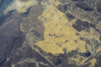 Oblique aerial view of a the depopulated township of Corra-Lairig and cultivation remains, Glen Shee, looking SSE.