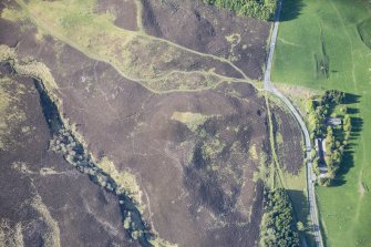 Oblique aerial view of buildings and enclosures at Lair in Glen Shee, looking N.