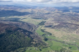 General oblique aerial view of Gleann Fearnach with Glenfernate Lodge and Loch Crannach beyond, looking NNE.