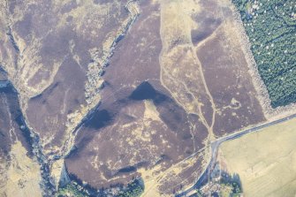 Oblique aerial view of buildings and rig and furrow at Lair, Glen Shee, looking WNW.