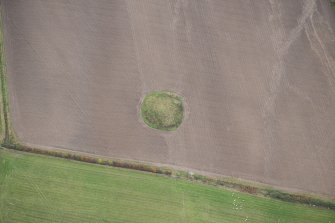 Oblique aerial view of the cairn, looking SE.