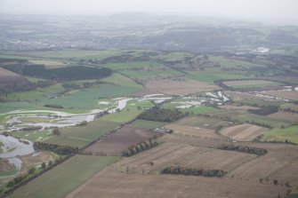 General oblique aerial view of the flooding along the River Earn with Perth in the distance, looking NE.