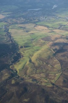 General oblique aerial view of Baile a'Bhruthaich with Pitlochry beyond, looking WSW.